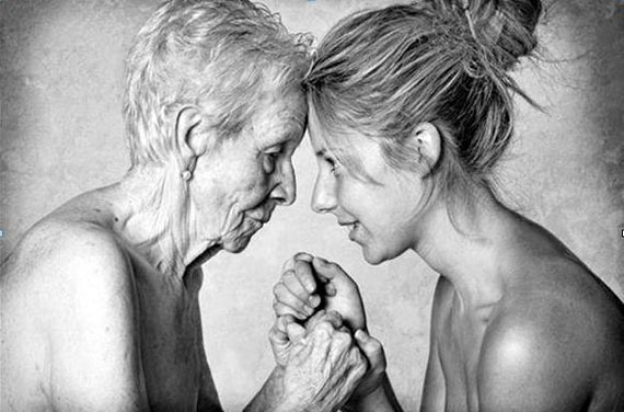 Aging mother and daughter in touching moment